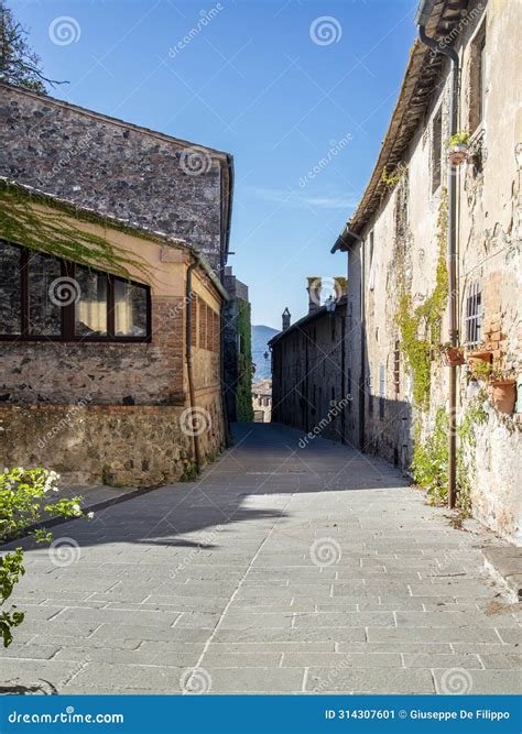 The Colorful Medieval Houses and Alleys of a Tuscan Village Stock Image