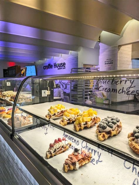 A Display Case Filled With Lots Of Different Types Of Pastries