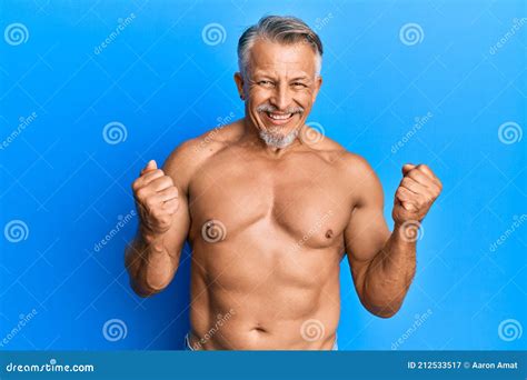 Middle Age Grey Haired Man Standing Shirtless Excited For Success With