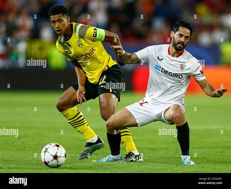 Francisco Alarcon Isco Of Sevilla FC And Jude Bellingham Of Borussia