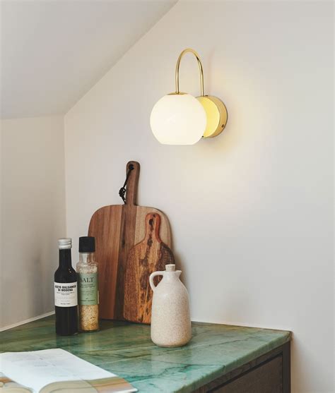 Brass Swan Neck Wall Light With Opal Shade