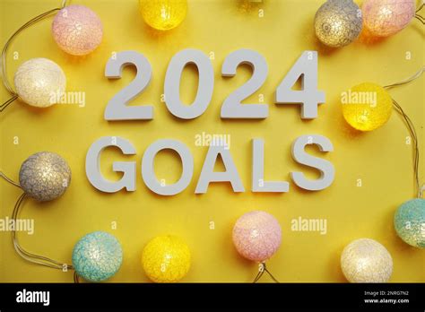 2024 Goals New Year Resolution With Led Cotton Balls On Yellow