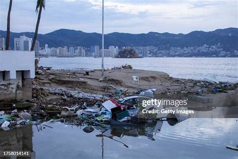 A car is seen sunk after hurricane Otis hit Acapulco on October 25,... News Photo - Getty Images