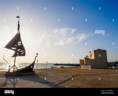 Monument To The Fisherman And Santuario Diocesiano San Vito In Riva Di