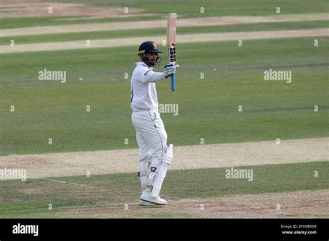 Murali Vijay Of Essex Raises His Bat To Celebrate Reaching His Fifty