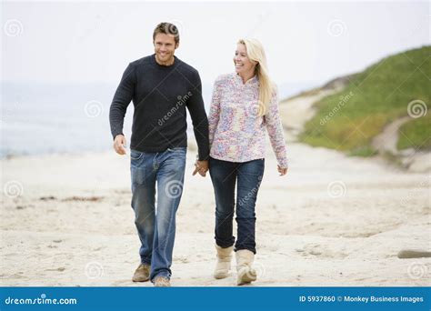 Couple Walking At Beach Holding Hands Stock Photo Image 5937860