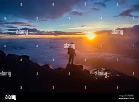 Climber at sunrise on Acatenango Volcano, Antigua, Guatemala Stock ...