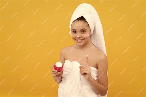 Premium Photo Happy Teen Girl In Shower Towel Apply Facial Cream Thumb Up