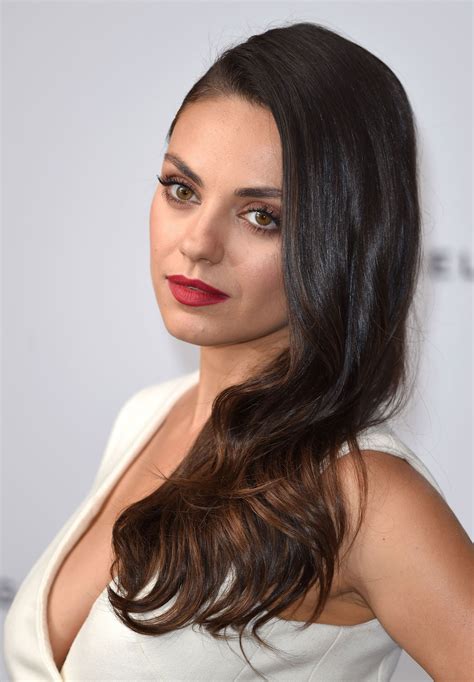 Mila Kunis Tatovering Mila Kunis Bares Cleavage At 'Jupiter Ascending'
