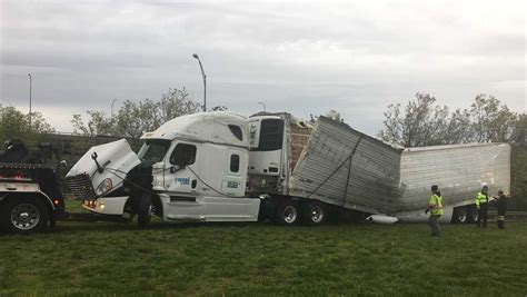 Tractor Trailer Rolls Over On Mass Pike Ramp