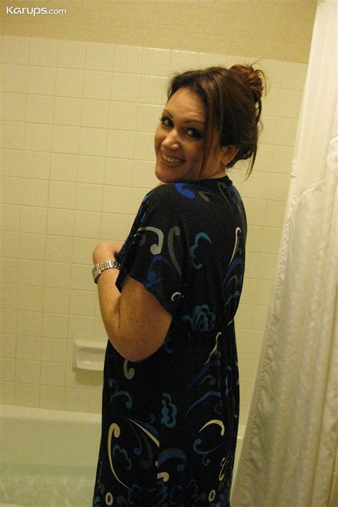 Caucasian MILF Ryan Anne Flaunts Her Large Breasts In The Shower