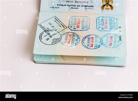 Visa And Customs Stamps In Passports Stock Photo Alamy