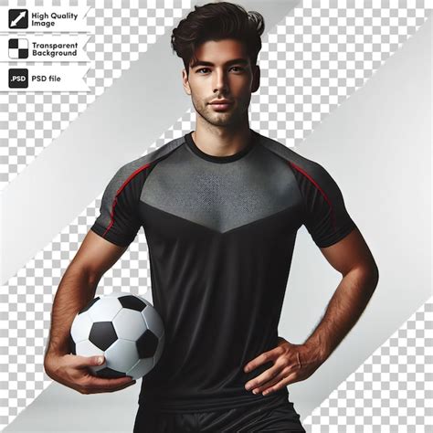 Premium Psd A Man In A Black And Red Soccer Jersey Holds A Soccer Ball