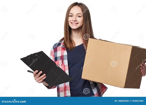 Smiling Woman Holding Cardboard Box And Document Signing Sheet Stock