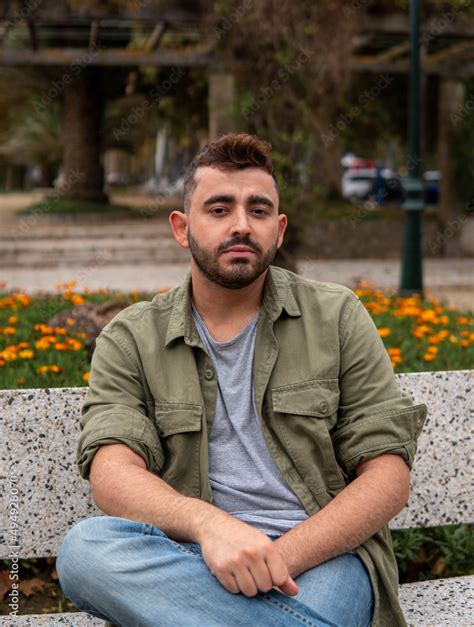 A Caucasian 24 Years Old Male On The Beach In Spain Sitting On A Park