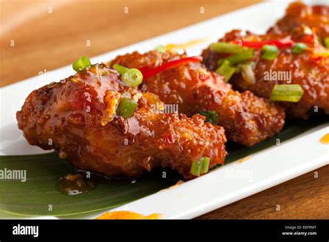 Tangy Thai Spicy Chicken Wings Stock Photo Alamy