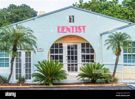 Dentist office outside exterior building neon sign entrance landscaping ...