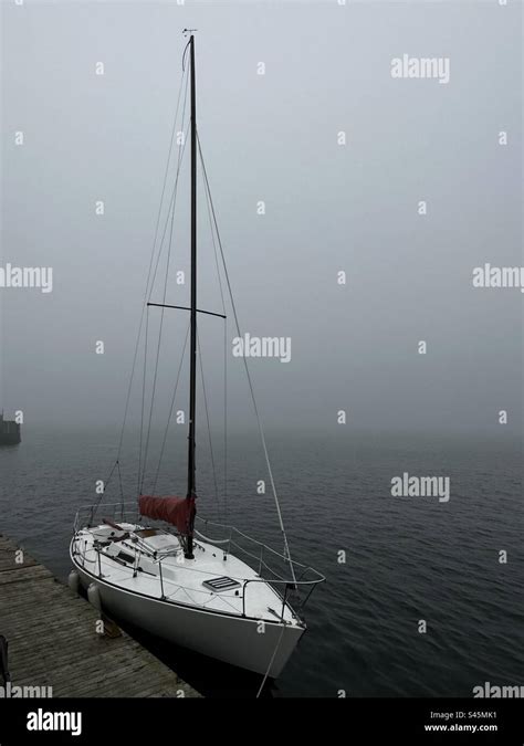 Boat and Wharf Stock Photo - Alamy