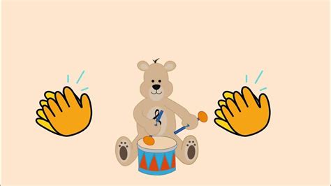 A Teddy Bear Sitting On Top Of A Drum With Two Hands Coming Out Of It