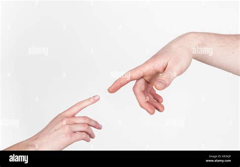 Fingers Of Two People Nearly Touching Isolated Stock Photo Alamy