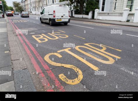 Double Red Lines On A Red Route In London Stock Photo Alamy