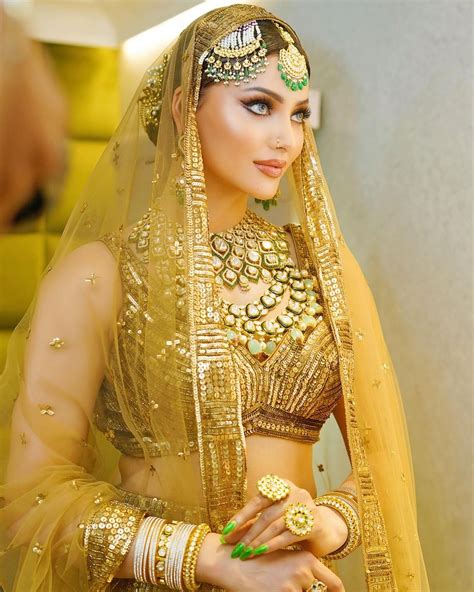 Urvashi Rautela Dons A Bridal Look Stuns In A Golden Hued Lehenga