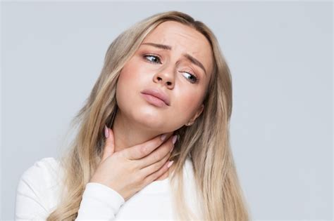 Premium Photo Closeup Portrait Of Sick Young Blonde Woman Having Sore