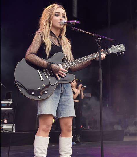 2018 Sabrina Carpenter (playing a Gibson guitar) performs “Run And Hide ...