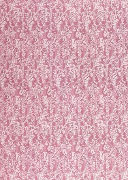 Premium Photo A Pink Wallpaper With A Floral Pattern