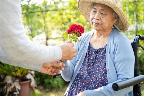 Caregiver Daughter Hug And Help Asian Senior Or Elderly Old Lady Woman