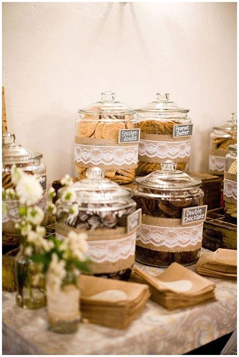 Several Jars Filled With Food Sitting On Top Of A Table