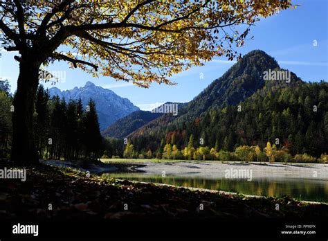 Lake Jasna On A Beautiful Afternoon In Autumn With A Clear Reflection