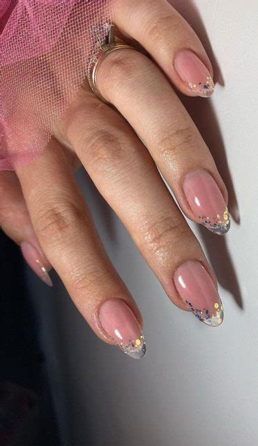 French Glass Nails That Re Sophisticated And Understated Gold Decal Glass Tips