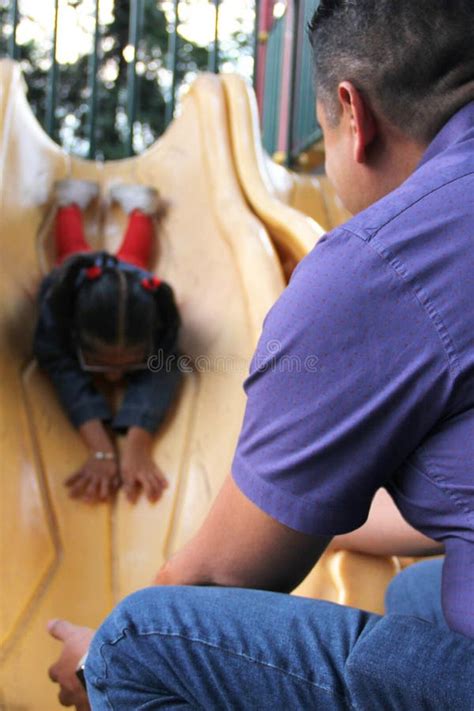 Dad Takes Care Of His Year Old Brunette Latina Daughter In The Park