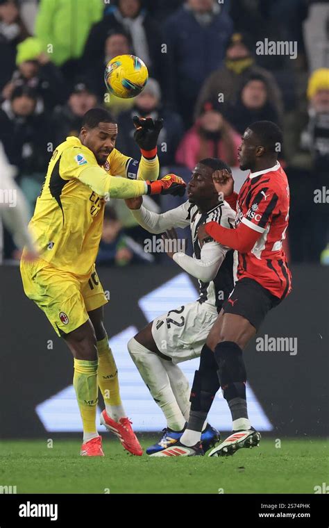 Turin Italy 18th January 2025 Mike Maignan Of AC Milan Clashes With