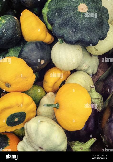 Close Up Of Yellow White And Green Pattypan Squash In The Produce Aisle