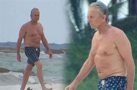 Michael Douglas Goes Shirtless On The Beach For Sad Swim