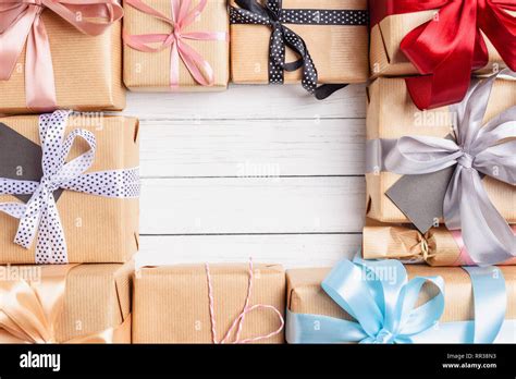 Frame Of Gift Boxes With Ribbon And Bows On White Background Copy