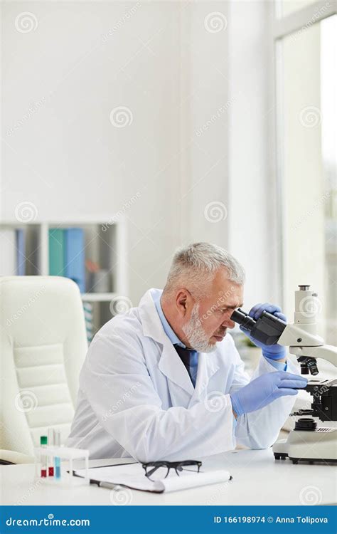 Mature Doctor Working In Laboratory Stock Photo Image Of Smiling