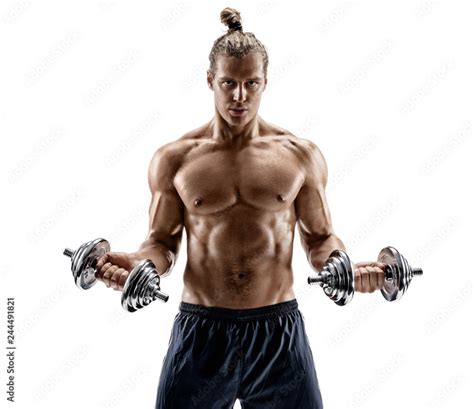 Powerful Bodybuilder Doing The Exercises With Dumbbells Photo Of Strong Male With Naked Torso
