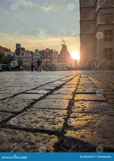 Low Angle Street View Of Sunset Behind Of Old Colorful Tenement Houses