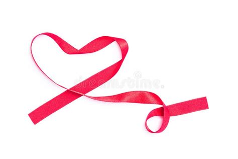 Red Ribbon In Heart Shape For Raising Awareness On World Aids Day Stock