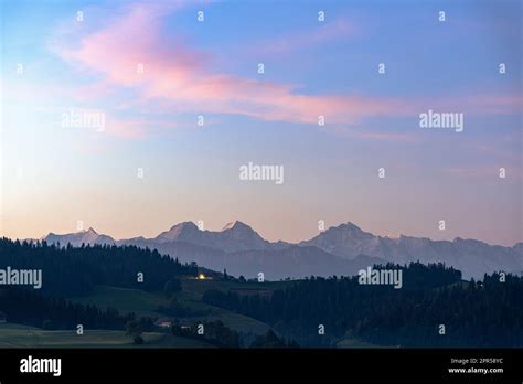 Eiger Monch And Jungfrau Peaks Under A Colorful Sky At Dawn Sumiswald