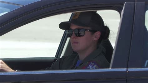 K F A Pilot Major Kristin Beo Wolfe Driving A Car And F