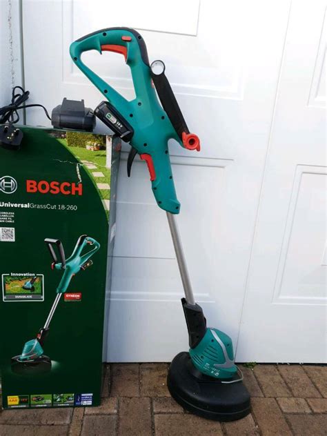 Bosch ART26-18Li Cordless Battery Strimmer BOXED&original spare blades ...