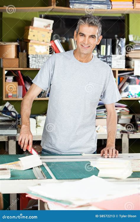 Confident Mature Male Worker Standing At Table Stock Image Image Of