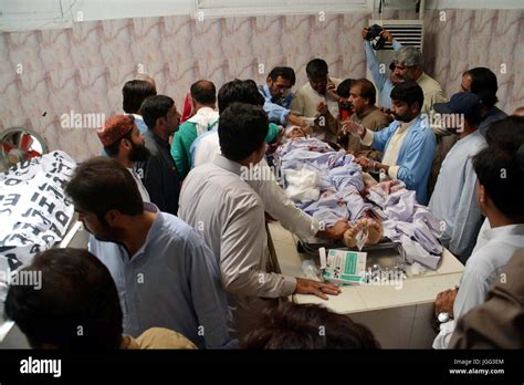 Paramedical Staffs And People Gather Near Dead Bodies Of Firing