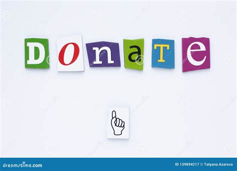 Word Donate From Cut Letters On White Background Donation Concept A