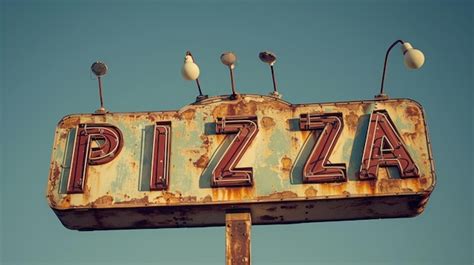 Premium Photo Vintage Pizza Sign Rust And Retro Charm Against Blue Sky