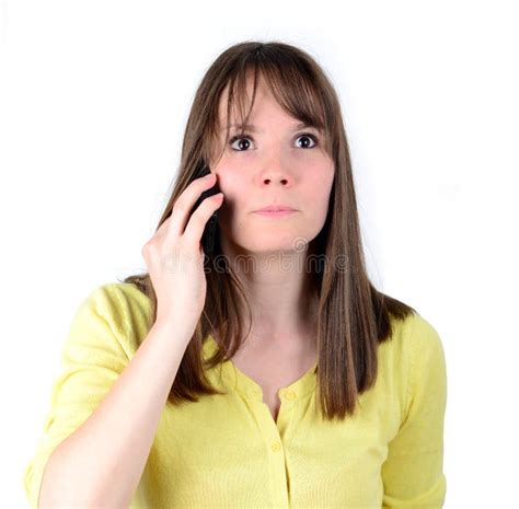 Beautiful Woman Talking On Cellphone And Being In Shock Of News Stock